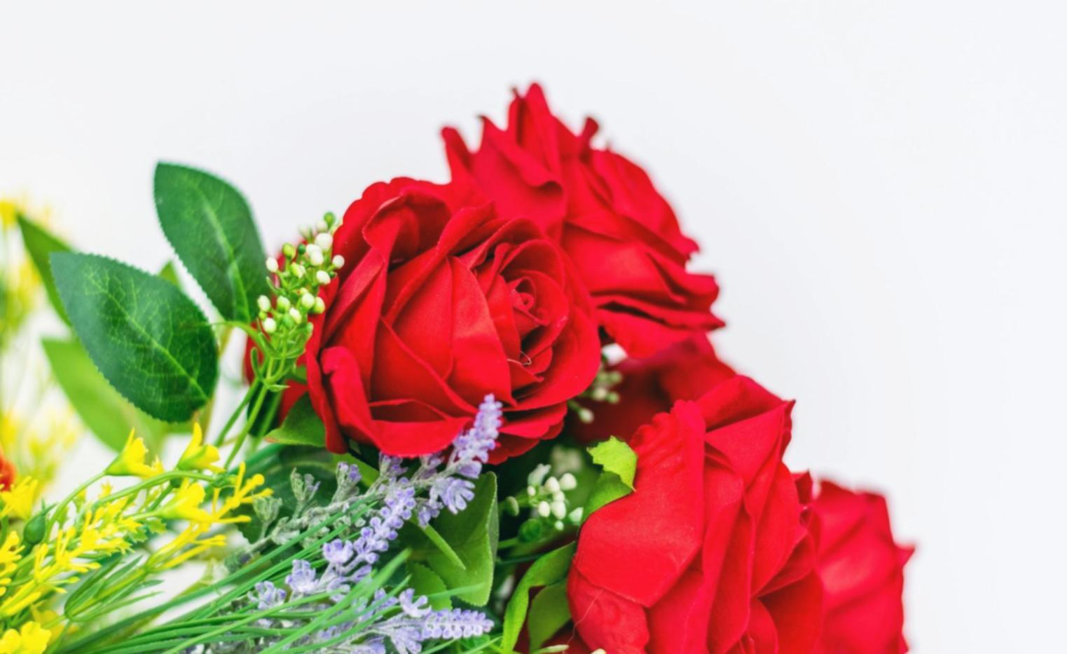 Florist arranging a structured business presentation with flower samples